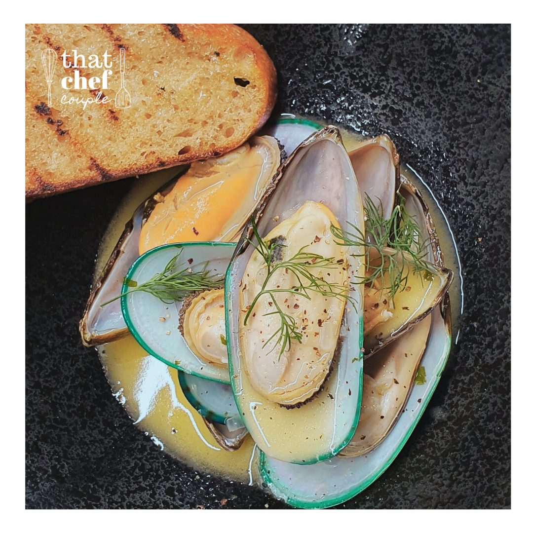 Green-lip mussels in white wine garlic butter and crusty sourdough slice