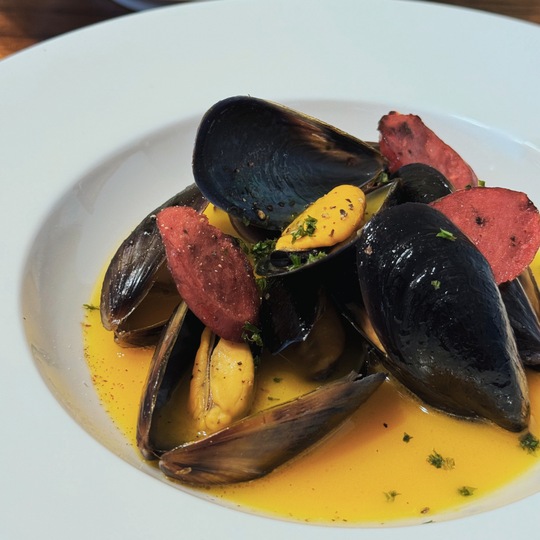 Mussels and chorizo with saffron white wine sauce