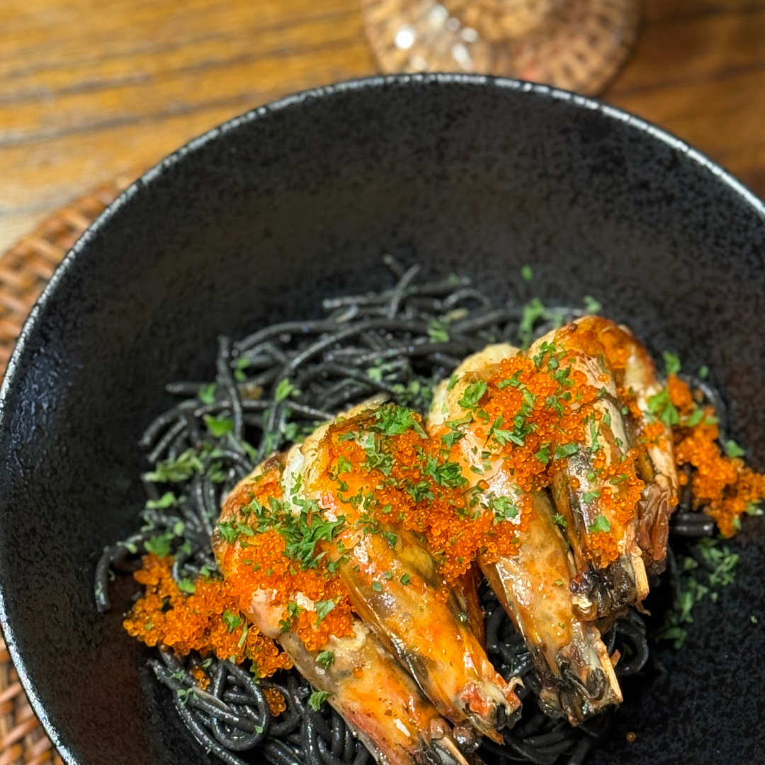 Squid ink pasta with gambas al ajillo