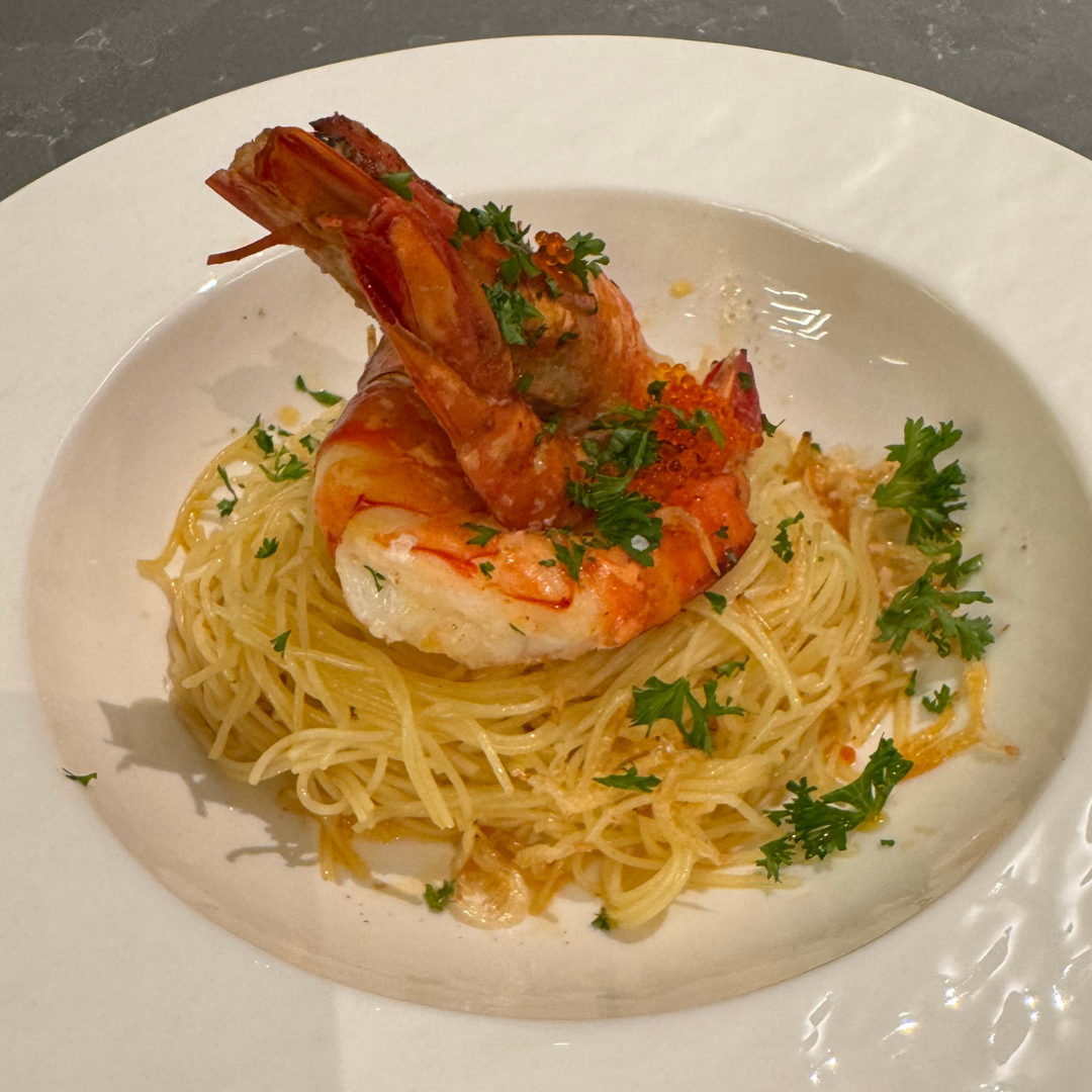Capellini with shrimp-infused oil and sauteed smoked paprika prawn